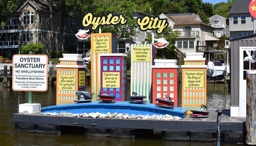 Oyster City floating monument educational display